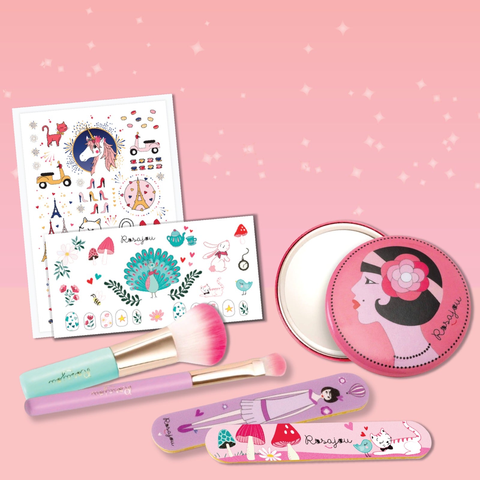 Rosajou Makeup set with mirror, brushes, and stationery items on a pink background
